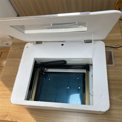 Độ chính xác cắt cao và khu vực cắt 25 * 36 CM Hệ thống cắt laser cho màn hình bảo vệ